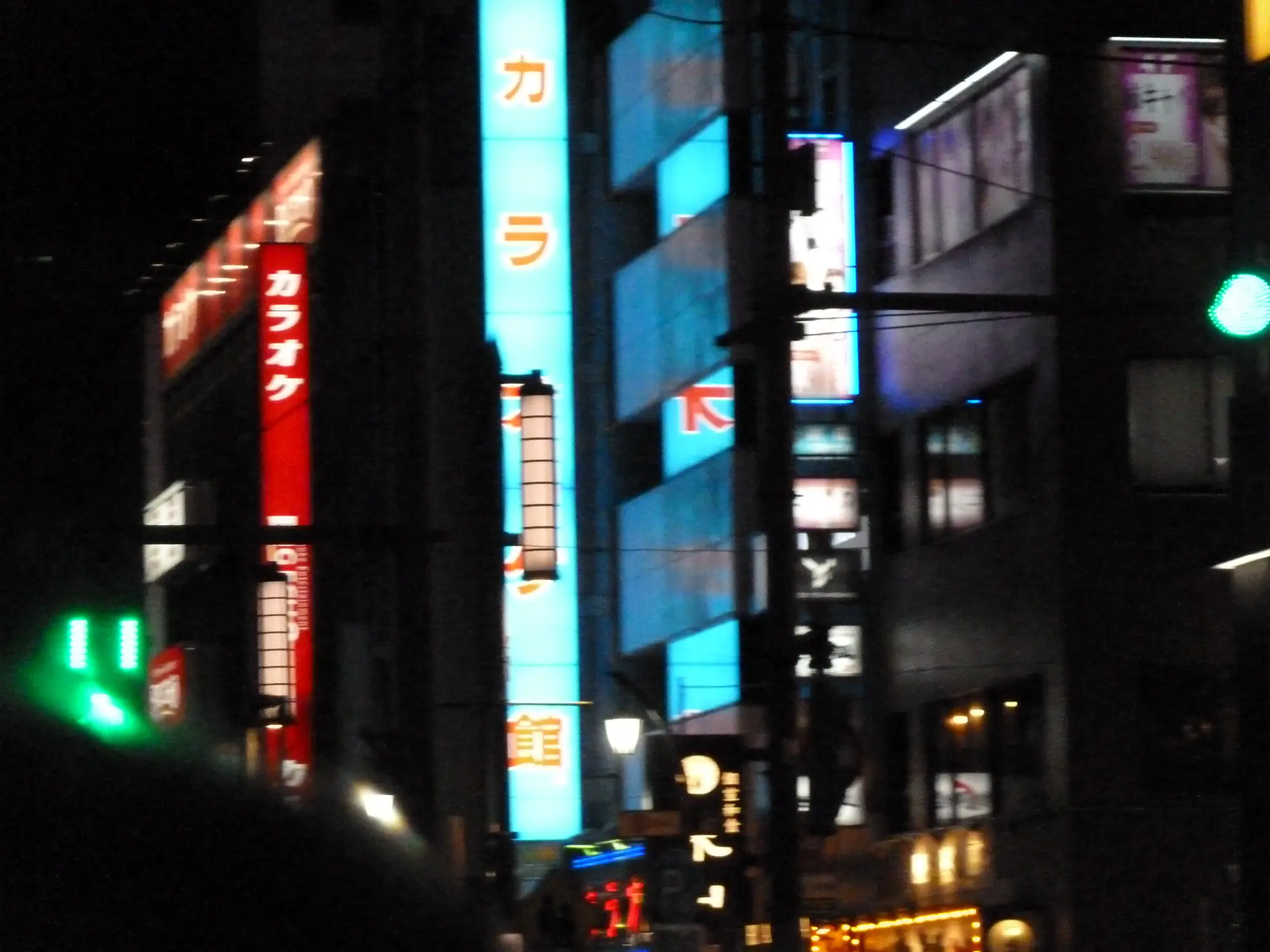 background displaying buildings in tokyo at night